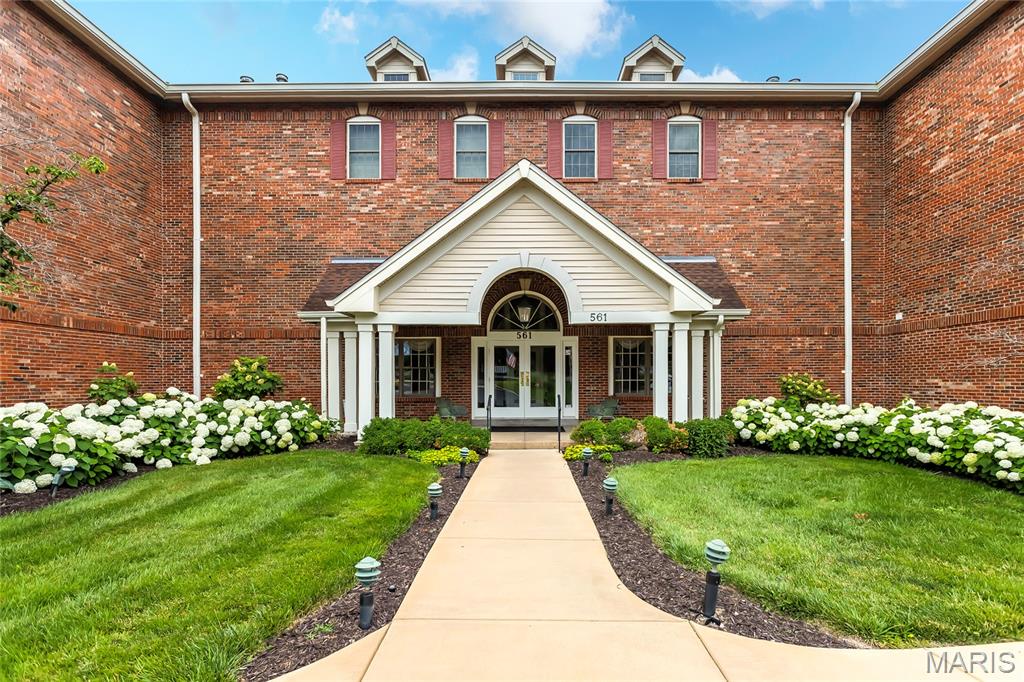 Spectacular top-floor penthouse-style condo in Creve Coeur! This condo offers 2,356 square feet of single-level living with 3 bedrooms, 2.5 bathrooms. This end-unit residence has been fully renovated, featuring hardwood floors through the foyer, dining room, kitchen, and primary suite, along with updated lighting throughout. The kitchen showcases stainless steel appliances, custom cabinetry, and granite countertops. The primary bath is a true retreat with a soaking tub, double sink marble countertop vanity, heated floors, and a new shower. Vaulted/coffered ceilings elevate the living room, dining room, and primary bedroom, while sliding Japanese screens add a unique architectural touch to this light-filled home. Additional highlights include: crown and chair-rail moldings, a spacious entry foyer, gas-log fireplace, in-unit laundry, heated floors in 2nd full bath, and central vac. One HVAC system was replaced in 2018. The unit includes a private storage room on the same floor, and two assigned garage parking spaces. The building includes an elevator. Residents enjoy access to a community pool, with HOA covering insurance, water, sewer, trash, and snow removal. Ideally located near major hospitals, highways, shopping, and dining, in the desirable Parkway North School District!