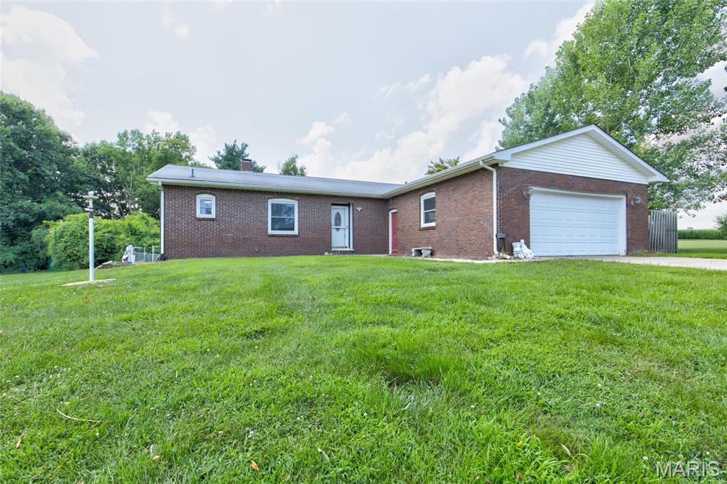 Located in Spring Valley Estates, this spacious ranch home is just a quick walk away from the stocked lake for those warm-weather fishing days and a brief drive to Grafton's dining and entertainment district. This 3-bed, 2-bath home is all on one level, perfect for folks who don't enjoy or can't manage stairs. A wood-burning fireplace, serviced last year, provides warmth and ambience in cool weather, and the 3-season sunroom offers additional living space as well as a pleasant view of the property. This is an all-electric home. Built-in bookcases in the living room, an eat-in kitchen and a crawl space for extra storage. Water heater 2024, HVAC 2021. Association fees include maintenance of the lake, roads and common areas. HOA fees $480/year/lot = $960/year for both lots. There's a lot to love here. Contact your realtor for a private showing soon. 
This is an estate and is being sold in As Is condition with no repairs being done by the executor. County records show 3 lots with the property, but lot #52 (on the corner) has been sold. Lots 53 and 54 remain with the home. Before making an offer on any property, buyers should independently verify all MLS data, which is derived from various sources and not warranted as accurate.