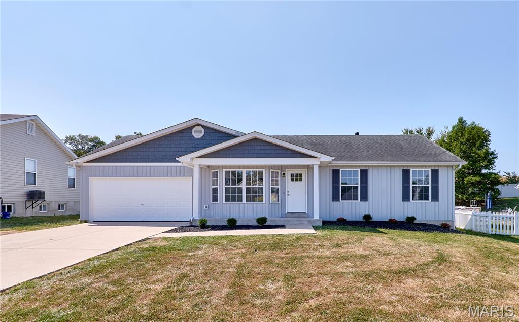 You’ll be the first to call this newly renovated home in the Eagle Bluffs subdivision in Winfield home.  The home sits on about 1/3 of an acre of fenced level ground.  This 3 bedroom 2.5 bath home has new luxury vinyl plank and carpet throughout.  The basement is finished with a large sleeping/craft room with attached half bath and a large open living area.  The kitchen includes new Stove, Dishwasher, and microwave, and new butcher block counter tops with a large single basin stainless sink.  Attached is an oversized 2 car garage.  No need to look like the rest of the houses in the subdivision because your home has new custom board and batten vinyl siding.