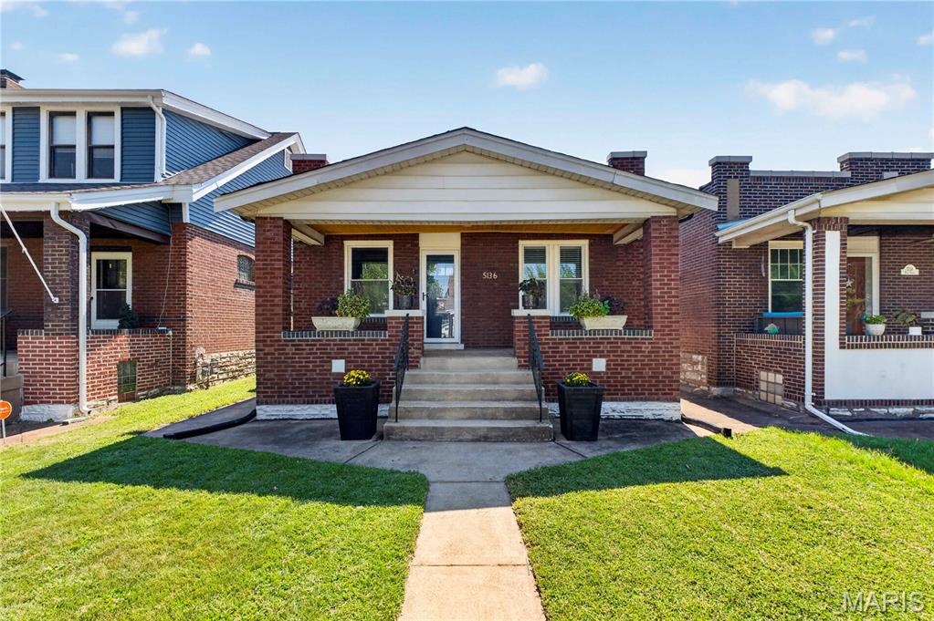 Modern, lovingly maintained, and thoughtfully updated, this Princeton Heights bungalow beauty welcomes you with a spacious front porch, lures you inside with gorgeous new floors, serves you a cool drink around the kitchen island and asks about your day. Warm and inviting with spacious rooms and a bright, airy feel, you'll feel right at home the moment you walk through the door. There is also an oversize one-car garage out back, a fenced-in yard, and unfinished basement awash with opportunity.