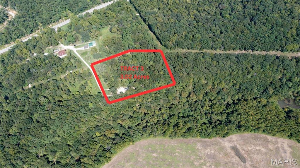 MUST SEE! Escape to the beauty of the Ozarks with this unique 3.02-acre surveyed tract offering breathtaking Bluff Ridge views of the Dry Fork and surrounding valley. Ideally located approximately 3 miles south of St. James on Hwy 8 and just 3 miles north of Maramec Springs Park, this property puts you close to some of the area’s best outdoor recreation. The property features a 14' x 32' functioning Airbnb cabin with a 6' timber frame porch, providing an excellent opportunity for a weekend getaway, short-term rental, guest space, or private retreat. The cabin is connected to its own well, septic, and electric and will be sold fully furnished, making it ready to enjoy or continue operating as an Airbnb. The well is equipped with a 1.5-horsepower pump, and the property includes a 1,000-gallon concrete septic system, which was pumped in 2024. Inside the cabin, you'll find: Vinyl flooring, full bathroom, tankless water heater, water filtration system, wall-mounted A/C unit, electric heaters in the main room and bathroom, backup propane heater, fully furnished and ready to use
Nature enthusiasts will love the convenient proximity to Woodson K. Woods Conservation Area and Mark Twain National Forest property, offering abundant opportunities for hiking, hunting, fishing, and exploring the great outdoors. Whether you're looking for an income-producing Airbnb, weekend retreat, hunting getaway, or your own peaceful piece of the Ozarks, this property offers an incredible combination of location, views, utilities, and opportunity. Fiber internet available.
Additional tracts available, please refer to the following MLS number: 26055719, 26056686, 26056834