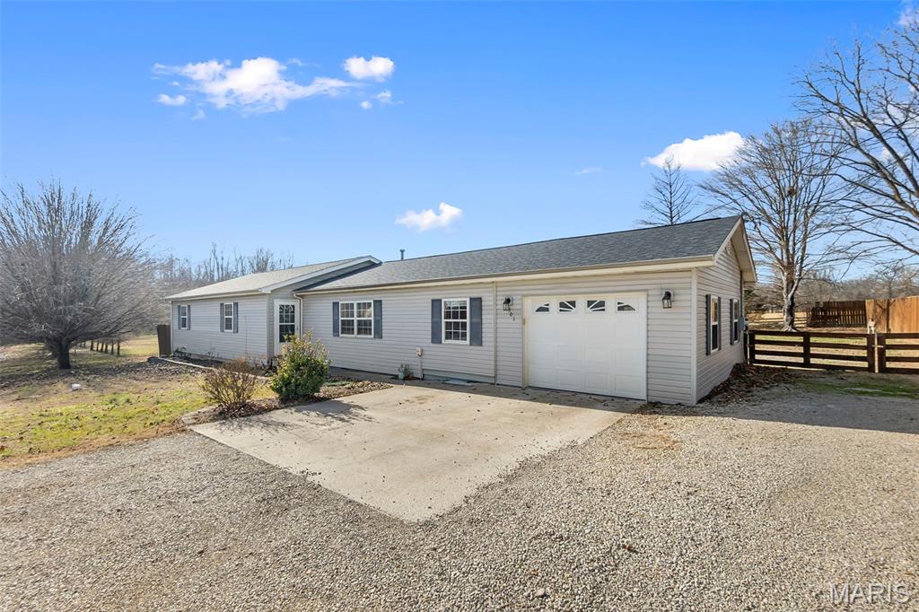 Welcome to this beautifully maintained ranch-style home offering approximately 1,755 sq ft of comfortable living space, ideally located just on the edge of the city limits of Marble Hill. Enjoy the best of both worlds—convenient city utilities paired with the privacy and openness of a stunning 1.76-acre parcel.  This inviting 3-bedroom, 2-bath home features generously sized rooms throughout, highlighted by a gorgeous kitchen complete with striking cabinetry and an eye-catching backsplash—perfect for both everyday living and entertaining.  Step outside to unwind on the spacious covered deck, with plenty of room for a swing, outdoor dining, and relaxing evenings. The backyard is designed for enjoyment, featuring a fenced area with a 27-foot above-ground pool, ideal for summer fun.
A standout feature of this property is the impressive 30x75 shop building, equipped with four overhead doors and a walk-through entrance. With its own separate utilities, this versatile space offers endless possibilities—whether for business, hobbies, or entertaining. Inside, you’ll find areas with central heat and air, water access, a wood stove, two gaming/entertainment spaces, a wash or paint bay, 220-amp service for welding, and airlines installed throughout.  Beyond that, the property continues to impress with a large open field, beautifully tree-lined at the front for added privacy—offering even more space to expand, explore, or simply enjoy the peaceful surroundings.  This is truly a one-of-a-kind property that must be seen in person to fully appreciate everything it has to offer.