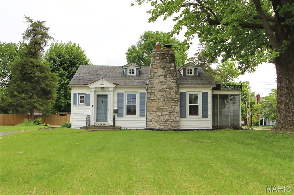 Welcome to 1800 E. B St. in Belleville, a charming and beautifully updated home full of character, comfort, and space to enjoy! Nestled on a .53-acre corner lot, this adorable 1 bed/2 bath home offers the perfect blend of timeless charm and modern updates. Step inside to find a welcoming foyer with coat closet and a stunning stained-glass window that sets the tone for the unique details throughout. The bright and inviting living room features a woodburning fireplace (that will need work to be usable) and flows seamlessly into the sunroom, the perfect spot to relax with morning coffee or unwind at the end of the day. You'll also love the spacious bedroom, full bath, dining room with built-in hutch and bay window, and the charming kitchen complete with a Murphy table, and included appliances.
The recently refinished lower level adds incredible living space with a huge family room featuring an electric fireplace, a beautifully updated spa-like bathroom with clawfoot tub and gorgeous pedestal sink, plus a spacious laundry and utility room. Outside, enjoy peaceful evenings on the deck, plenty of yard space to entertain or garden, and ample storage with both a shed and detached one-car garage. There is ample parking in the multiple driveways. Major updates include a new boiler (2026), remodeled basement bath (2025-2026), new water heater, plumbing lines, and lower-level flooring (2024), plus new windows in 2022. Packed with charm, updates, and room to enjoy both inside and out, this home is ready to welcome its next owner!