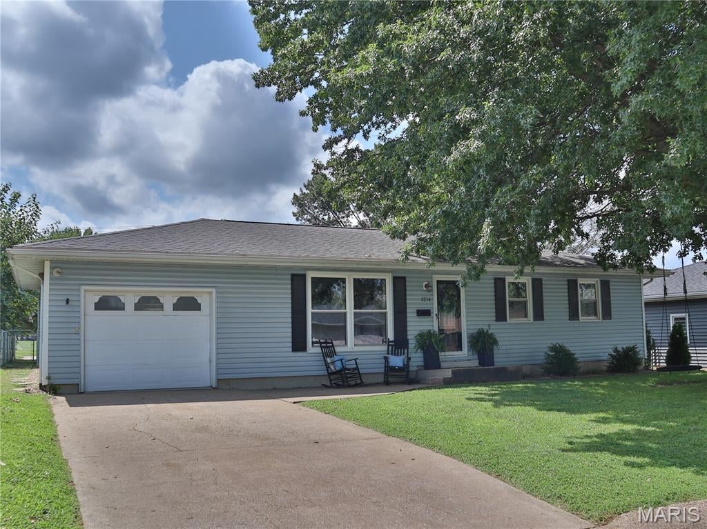 Don't Miss This One! Spacious 3-bedroom, 2-bath ranch in a highly desirable location near the golf course. The kitchen is a standout, featuring beautiful cabinetry, plenty of storage, warm inviting feel, and is perfect for everyday living and entertaining. Enjoy the extra parking pad in the back, along with the one car garage. The lower level offers an abundance of storage, a non-conforming bedroom/bonus room, and large family room. Come take a look and make this one yours!