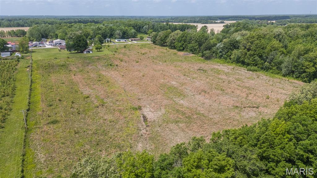16.59 acres m/l of level, versatile ground offering exceptional potential for a variety of uses. Previously utilized for hay production, this multi-use property also provides excellent hunting and outdoor recreational opportunities. With its level topography and all utilities nearby, the property is well-suited for a private homesite, small farm, residential development, or potential subdivision. Whether you’re looking to build, invest, or enjoy a recreational retreat, this tract offers a rare combination of usability, accessibility, and future potential.