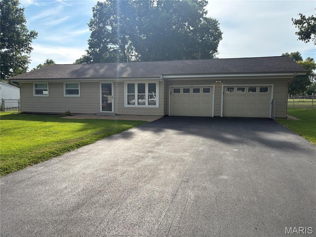 Available for immediate occupancy,  you will love this updated ranch home.   Updated throughout.  Open and bright.   Fenced in yard with large covered patio.   Oversized 2 car attached garage.