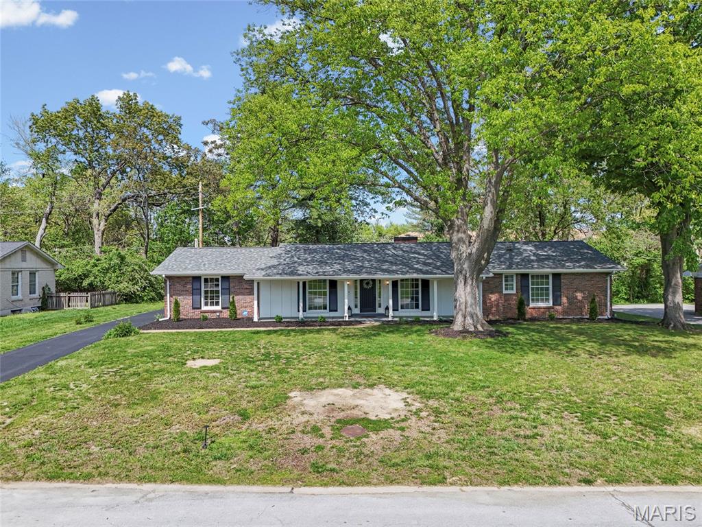 OPEN SUN 1-3PM! Welcome to this gorgeous ranch with approx 2900+ livable sqft & an exceptional location! This 5+ bedroom home is perfect for the growing family. Big, covered front patio leads you to the inside of this stately home. Inviting entry hall with tile as you enter. Spacious 4 bedrooms on the main floor while a 5th bedroom awaits for you in the lower finished level (PLUS there's another potential sleeping room downstairs). Center hall foyer leads you the formal dining on the left and office (bedroom) on the right. After you walk through the wide hallway you'll enter the open living room area with glass doors to your private backyard. Living area also features a fireplace, skylight, vaulted ceiling beams and opens up the spacious kitchen with a bar top & additional eating area/ breakfast nook. Sleek granite countertops, plenty of cabinetry and all new stainless steel appliances round up this gourmet kitchen. Full bath with an oversized vanity & beautiful tiles.  You'll love the primary suite and its big bath featuring a walk-in shower. Large lower level boasts with additional living sqft hosting a family room, an additional sleeping room (or home office or gym), the fifth bedroom AND a full bath. Not to mention the spacious unfinished basement area and the utility room with laundry area set up. Ready for your ideas to finish additional living space! This house does not lack of size and has a great layout & thoughtful finishes throughout! Attached two car garage. Already fully fenced-in backyard with a big patio for entertaining friends and family. Move-in Ready for you - already passed occupancy. Conveniently located in the heart of Creve Coeur - close to all restaurants, shopping, highways and within walking distance to schools! You'll fall in love with this home, CALL NOW