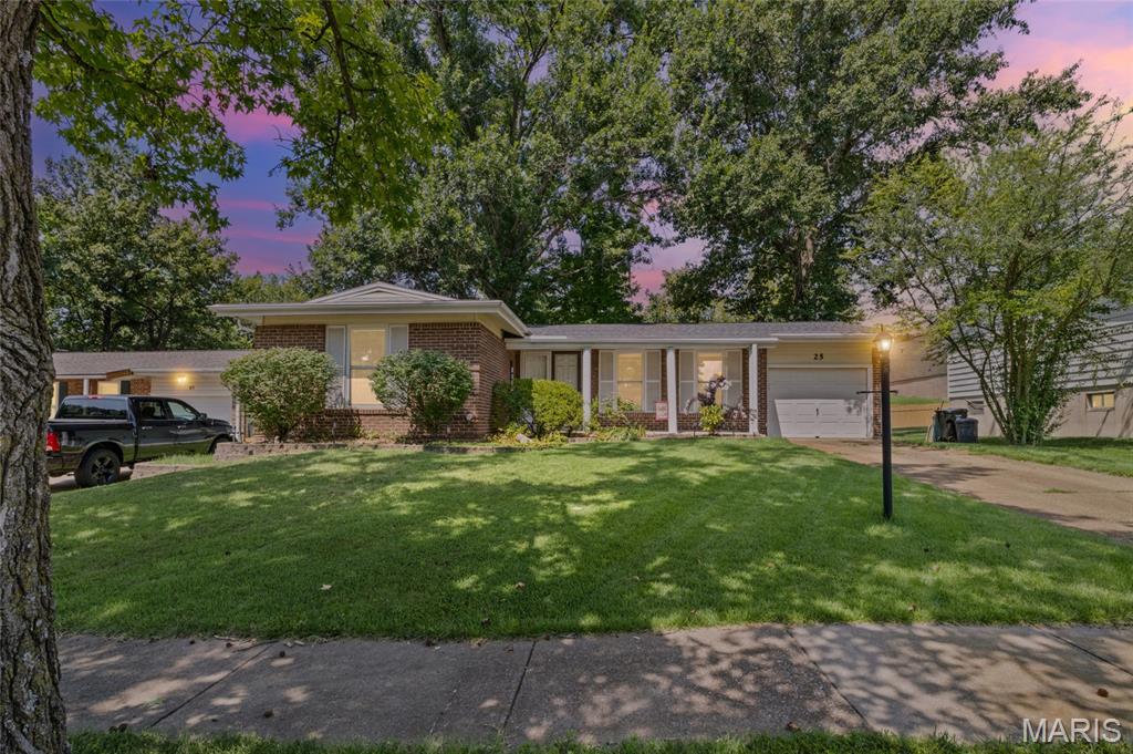 Welcome to home to this 3 bedroom, 2 bathroom brick ranch nestled in a cozy neighborhood in Rockwood School District. Cared for by the same family for three decades, this home is ready for it’s next chapter!  Step inside to your spacious living room, filled with natural light, original wood floors and fresh paint throughout. The dining area features built-in cabinetry and a large window overlooking the yard — a lovely spot for everyday meals or hosting guests. You will find granite countertops, custom cabinetry and a gas range in the bright and roomy kitchen. The spacious primary bedroom with large closet has wood floors under carpet and hosts an ensuite bathroom that has been tastefully updated. There are two more bedrooms on the main floor with a full bath, also updated, offering fresh, move-in-ready style throughout.  Downstairs, the partially finished basement provides fantastic bonus living space, complete with a bar — perfect for entertaining, game days, or a cozy retreat. Outside, you'll find incredible entertaining space with a huge covered deck overlooking the fenced-in backyard — ideal for summer barbecues, relaxing evenings, or watching kids and pets play. A single car garage adds everyday convenience and extra storage. This is a rare opportunity to own a lovingly maintained home, convenient to Gravois Bluffs shopping/dining district and quick access to highways.  Don't miss your chance to make new memories in this Fenton gem!