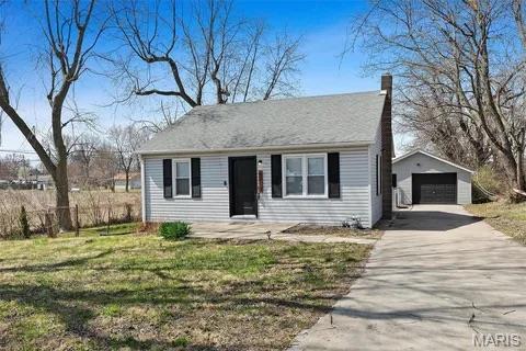 Adorable home located on a no-through street with easy access to Hwy 270, SWIC & SIUE. Home has laminate plank flooring, beautifully updated kitchen with white soft close cabinets and stainless appliances.A nice size bath is centrally located to bedrooms. The detached garage offers additional storage space for a car and outdoor equipment. This home offers a large partially fenced yard and additional acreage. There are 3 additional plats that come with the property located to the left of the home. Love the outdoors or just a quiet place for relaxation? This is the one for you! Total Acres, lot size and taxes paid reflect all 4 parcels.