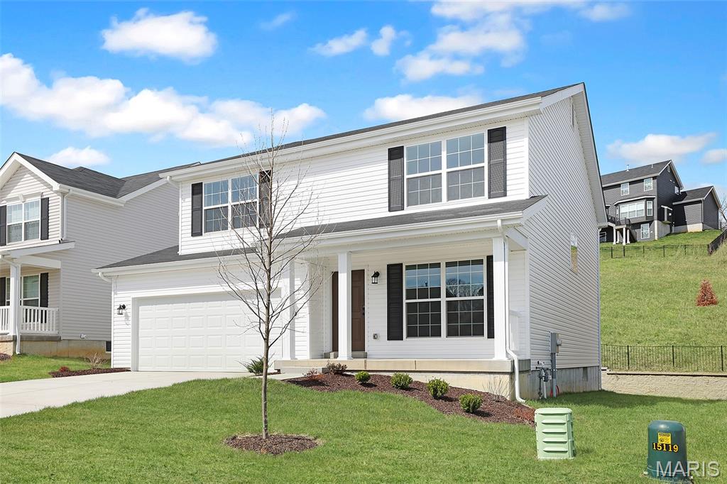New McBride Homes Sterling floor plan w/4BR 2.5BA is ready now! The main floor has wood laminate flooring & 6’ windows. Off the foyer, you’ll also find a large living room, plus a spacious family room adjacent to the dining area & kitchen. The kitchen features a peninsula, quartz countertops, with Sinclair Natural 30” cabinets, pantry, & black GE appliances. The dining area has a sliding glass door that leads to the backyard. Laundry area & half bath complete the main floor. Upstairs you’ll find the primary suite w/walkin closet, a private bath with shower/tub combo, single vanity & linen closet. 3 extra bedrooms share a full bath add convenience. Bedrooms 2 & 3 feature walk-in closets. Winding Bluffs Addition offers new homes in the Fenton area, minutes from Gravois Bluffs. Amenities include a pickleball court, athletic field, dog park, trails, & community lake. Enjoy peace of mind with McBride Homes’ 10yr builders’ warranty & incredible customer service! Similar photos shown.