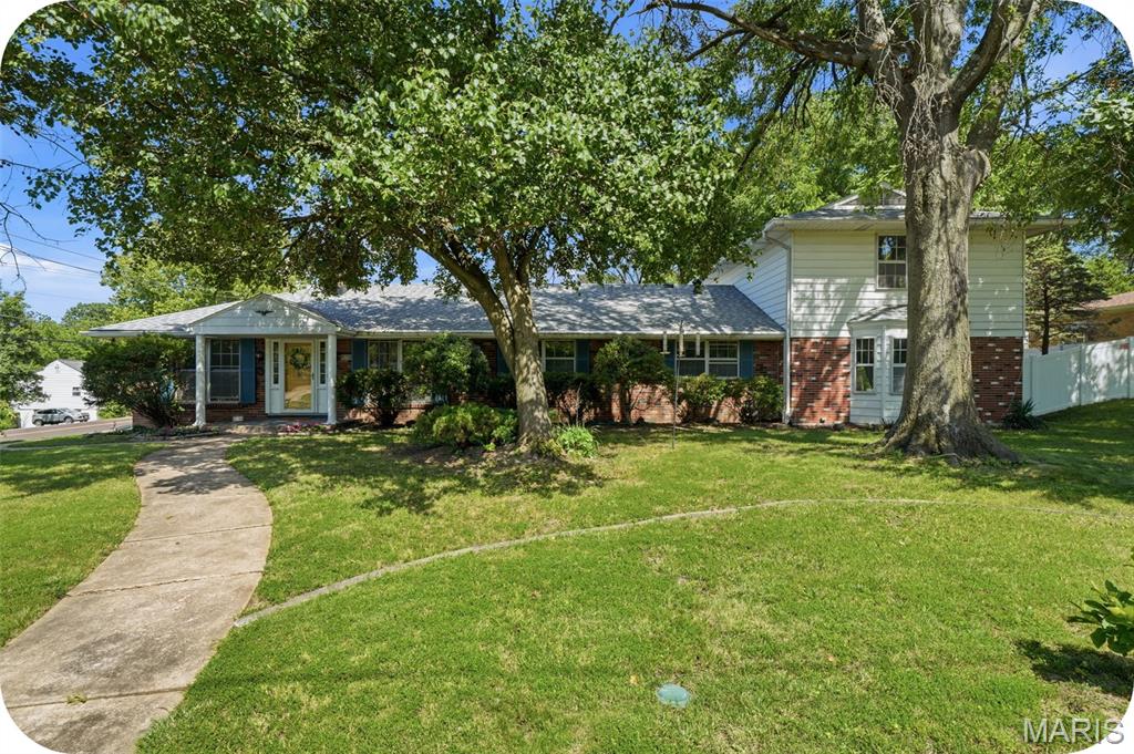 This is the one you’ve been waiting for! Spacious, unique, and full of character, this incredible home offers 6 bedrooms and 5 bathrooms with room for everyone and everything.

Step inside to an inviting open-concept layout where guests can easily gather between the stunning, newly updated kitchen and main living spaces. The kitchen truly shines with stainless steel appliances, a breakfast bar, and modern finishes—perfect for everyday living and entertaining alike.

Enjoy cozy evenings by the two-way fireplace shared between the living and dining rooms, adding warmth and charm to both spaces. The home also features a separate family room for even more flexibility.

Downstairs, you’ll find a one-of-a-kind vintage basement with a tropical paradise theme—a fun and memorable space ready for entertaining or relaxing.

Situated on a large corner lot, the property is surrounded by mature trees and beautiful landscaping. The fenced, level backyard includes a covered patio for outdoor gatherings and a private deck off the primary suite with ramp access to the yard.

Additional highlights include:

3-car side-entry garage
Ample driveway parking
Thoughtful layout with space for multi-generational living or work-from-home needs

Located in the Affton School District and just minutes from Cor Jesu, shopping, Grant’s Farm, and major highways, this home offers both convenience and comfort in a sought-after area.

Come see it in person—this one stands out from the rest!