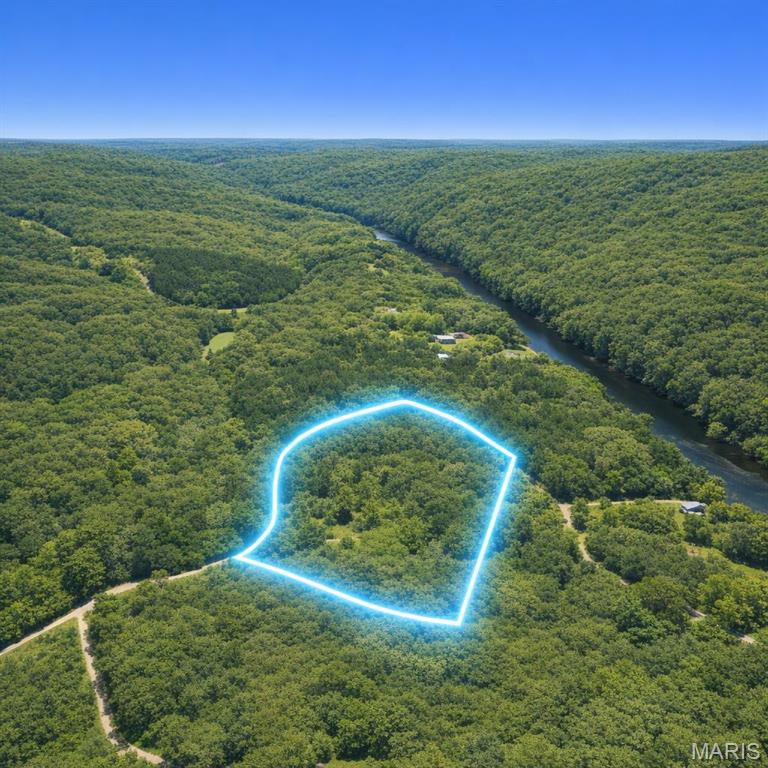 Opportunity awaits on this versatile 15-acre property just outside of Farmington! The property features two mobile homes, with one currently being utilized for storage, offering potential for additional living space, rental income, workshop use, or continued storage. A private well and sewer system are already in place, providing added convenience and value. With plenty of open space, this property is ideal for those seeking room to spread out, start a hobby farm, enjoy recreational use, or build their dream homestead. Enjoy the peace and privacy of country living while remaining just a short drive from town amenities. Don't miss this unique opportunity to own acreage with existing improvements and endless potential.