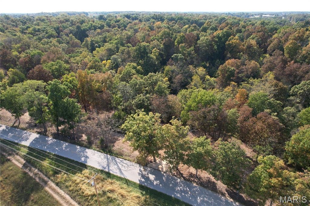 2.9-Acre Walkout Lot in Unincorporated Lincoln County with No Restrictions

Build the home, shop, barn, or private retreat you have been looking for on this 2.9-acre walkout lot in unincorporated Lincoln County. Cleared and ready to build on, this property offers a great head start for your plans while still giving you the privacy and space buyers want in a country setting. Located on blacktop just 1 mile from town, you can enjoy the quiet feel of acreage living without giving up quick access to daily conveniences. Public water, electric, and internet are available, making future connections simple as you prepare to build. With no restrictions, this lot gives you flexibility for the lifestyle you have in mind, whether that includes a custom home, outbuilding, animals, extra parking, or room to spread out. The walkout potential adds even more appeal, creating options for a lower-level living space, patio, or outdoor entertaining area overlooking the land. Opportunities like this are hard to find, especially with usable acreage, privacy, utilities nearby, and a convenient location. Offered at the low price of $119,900, this lot is ready for your vision!

With minimal subdivision restrictions, you have the freedom to design your dream home, add outbuildings, bring horses, and build a lifestyle that fits you. Located just minutes from town on blacktop roads with public water, Oakview Meadows delivers the perfect balance of privacy and convenience. Situated in unincorporated Lincoln County, owners enjoy lower taxes while still benefiting from Troy Schools and local utilities. This community is thoughtfully created for those who want space, flexibility, and a more peaceful way of living, all while staying close to everything Troy has to offer.