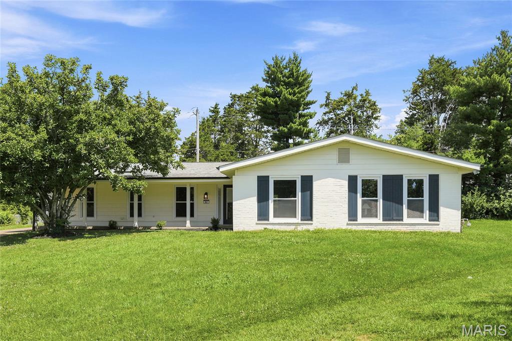 Completely renovated from the studs up, this masterfully redesigned home blends modern luxury with ultimate flexibility, offering 4 bedrooms (with 5-bedroom potential), 2 full bathrooms, and over 2,000 square foot of finished living space on a .25 acre lot in a quiet cul-de-sac. The sun-drenched open floor plan showcases brand-new premium flooring, fresh designer paint, and moder energy-efficient lighting. At its heart, the chef-inspired kitchen boasts elegant quartz countertops and brand-new stainless-steel appliances. A dedicated home office provides peace of mind with updated plumbing, electrical and flooring, new fixtures, and totally renovated spa-like bathrooms. Storage is abundant with plenty of deep closet space throughout, plus a spacious attached two-car garage. Outside, the home features brand-new premium siding and a newer concrete rear porch perfect for private outdoor entertaining.