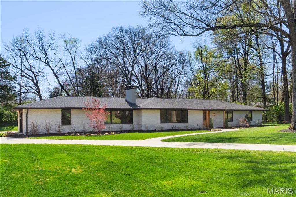 Completely renovated in 2021, this 3 bed, 2.5 bath ranch home has everything a buyer has on their ‘Must Have’ list.  Find beautiful wide plank flooring throughout the kitchen, dining area, family and office areas.  A double-sided stone fireplace sets the tone for a large gathering or friends or a quiet night in.  The master suite with walk in custom closet, spa bath with gorgeous shower and separate soaking tub make this the perfect retreat.  2 other bedrms and full bath are perfect for family or guests.  A guest powder room, office and mudroom complete the main level.  The lower level offers  a walk out to the backyard and a deep pour making it a great candidate for your finishing touches.  Large windows, open spaces along with high end finishes, Ladue schools and walk to Westwood country club make this the perfect choice.