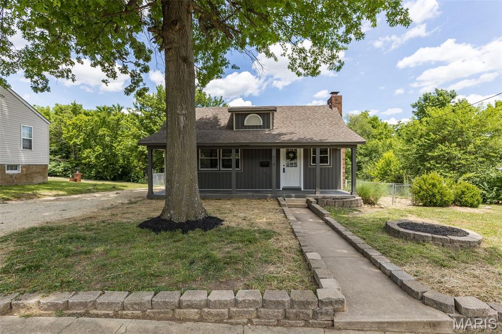 Beautifully remodeled 3-bedroom, 1.5-bath home located at 616 W. Main Street in Park Hills! This charming home offers fantastic curb appeal with a covered front porch, attractive landscaping, and a spacious deck overlooking the fully fenced backyard. Inside, you'll find custom kitchen cabinetry paired with stunning wood-grain countertops and included appliances. The updated bathrooms and new flooring throughout provide a fresh, modern feel. The inviting living room features a cozy wood-burning fireplace, while the separate dining room offers the perfect space for gatherings. Loaded with character, this home also boasts built-in shelving, updated fixtures throughout, and thoughtful details at every turn. Move-in ready and full of charm—don't miss your opportunity to make this beautiful home yours!