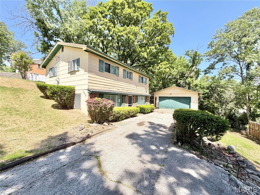 Investment opportunity awaits with this 4-bedroom, 1.5-bath home full of potential! Many of the major updates have already been completed, including a newer roof and HVAC system. The main level features a spacious kitchen, living room, dining room, convenient main-floor laundry, storage space, and a half bath. Upstairs, you’ll find four bedrooms and a full bath.
Situated on just over a quarter-acre lot, the property also includes a detached 2-car garage and plenty of room to make it your own. Bring your ideas and finishing touches to transform this home into exactly what you envision. Home is being sold as-is. Seller to perform no inspections or repairs.