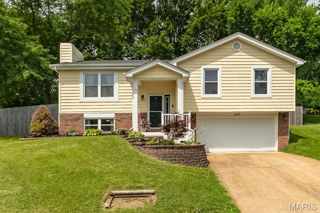 This is the one you've been waiting for! Nestled on a quiet cul-de-sac in desirable Ballwin, this spacious and meticulously maintained 3-bedroom, 2.5-bath split-foyer home sits on a fenced lot and offers numerous updates throughout. The beautifully remodeled kitchen (2022) features granite countertops, a breakfast bar, stainless steel appliances, and abundant workspace for cooking and entertaining. Separate Dining.  Major improvements include a new furnace and A/C (2025) and a privacy fence added in 2022.  The primary suite provides a comfortable retreat, while updated interior doors and fresh paint create a modern, move-in-ready feel. Located in the highly acclaimed Rockwood School District, you'll enjoy convenient access to Ballwin's outstanding amenities, including The Pointe at Ballwin Commons, North Pointe Aquatic Center, Vlasis Park, golf courses, walking trails, and numerous neighborhood parks. Don't miss this exceptional opportunity!