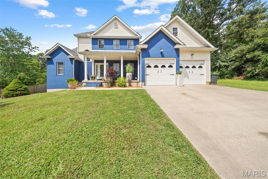 Elegant, Spacious & Exceptionally Versatile! Just minutes from Rolla's shopping, dining, amenities, and golf course, this beautiful home offers approximately 4,000 sq. ft. of thoughtfully designed living space across three levels. The main level features two bedrooms and two full baths, including a luxurious primary suite with jetted tub, separate shower, double vanity, and private toilet room. The well-appointed kitchen includes all appliances. Upstairs offers three additional bedrooms, a full bath, and an unfinished attic with HVAC already in place—providing exceptional potential for future living space. The partially finished basement expands the possibilities with a fourth full bath, kitchenette with sink and refrigerator, additional laundry hookups, and flexible space for entertaining, guests, recreation, or extended living. Additional unfinished storage space remains. Outside, enjoy a spacious concrete patio overlooking the backyard.