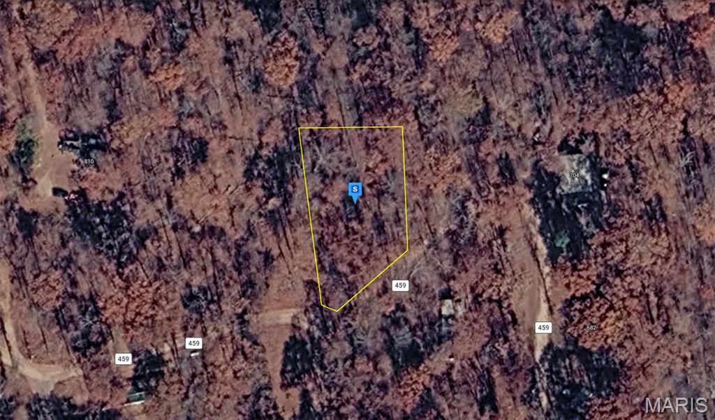 Discover this 17,000 Sq. Ft. residential lot in the Piedmont area of Wayne County, Missouri. Featuring gently sloped, wooded terrain, the property offers a peaceful setting in a quiet neighborhood with no HOA restrictions. Located just minutes from MO-34, the property provides convenient access to shopping, dining, schools, parks, and nearby communities. Enjoy the privacy of a wooded landscape while being close to outdoor recreation, scenic surroundings, and the natural beauty of southeastern Missouri. This vacant lot offers an excellent opportunity to build your future home or make a smart investment. Street addresses can be for listing purposes only and vacant land will receive a true street address once improved.