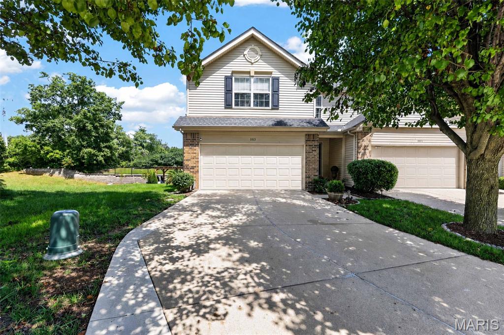 Welcome to low maintenance living in the heart of Cottleville. Prime location to access all that the sought-after area of Cottleville has to offer just minutes from downtown main street Cottleville. This beautiful home is an absolute must-see! Shows amazing & very well cared for and updated. As you enter, you will notice the hardwood floors throughout the main level. Inviting entry foyer leads to large great room w/ gas fireplace. Dining area has large bay area with door that leads to beautiful low maintenance deck with stairs and very private backyard that backs to thick trees and your very own covered pergola, brick patio area with stunning landscaping that is so relaxing & perfect for entertaining. Kitchen offers stainless appliances, large pantry, breakfast bar. Wood spindled staircase leads you up to a large primary suite with 2 large walk-in closets & luxury bath w/separate shower and large jetted tub, updated double vanity w/marble top.  2 other beautiful, good sized bedrooms with walk in closets & full hall bath w/oversized vanity. Plus, a 2nd floor laundry room & washer & dryer can stay.  Lower level offers a family room w/ bar area and a finished office/ sleeping area with egress window. 2 car garage w/ newer polywise coating that looks amazing. Home offers updated HVAC with zoned damper system plus air purifier. New roof and gutters in 2026. Hot water heater in 2025.