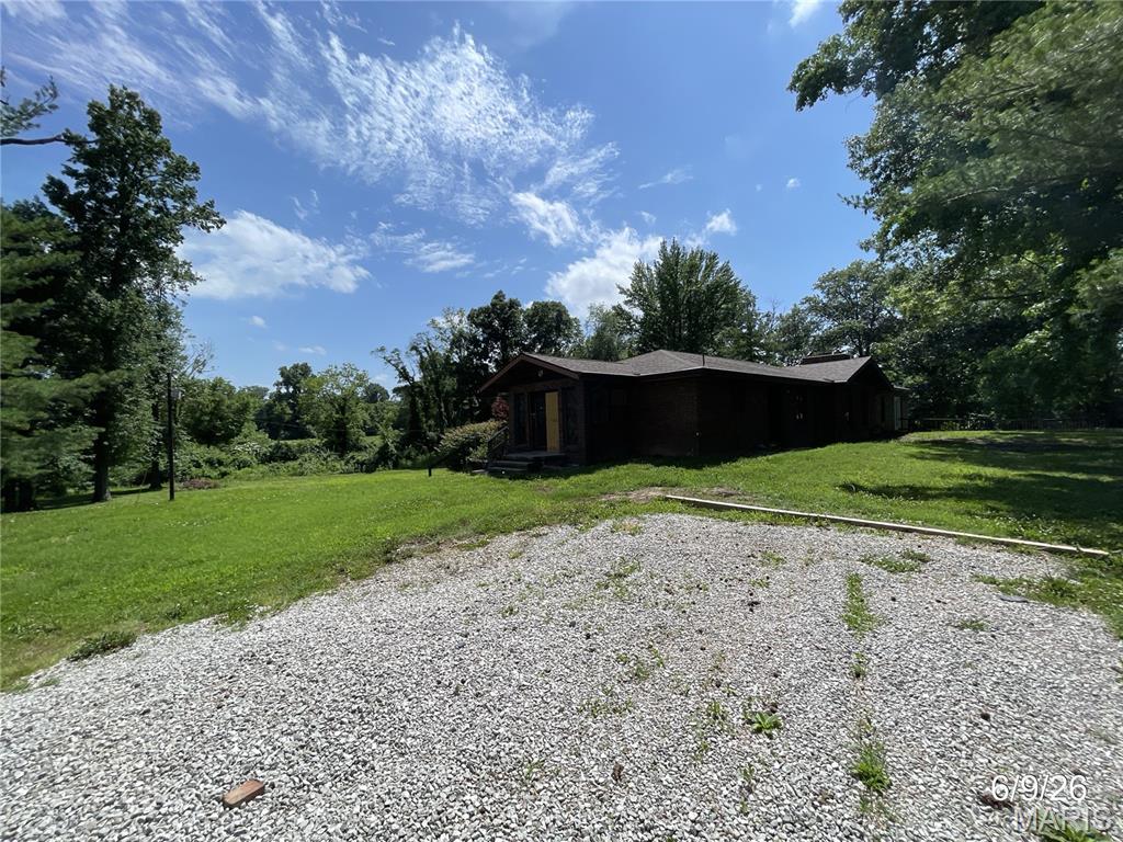 Welcome to 721 E Highway 40 in Troy! This spacious 3-bedroom, 2-bath home offers a comfortable floor plan with plenty of room to fit your lifestyle. The full basement provides excellent potential for additional living space, a recreation area, home office, or extra storage. Situated on a large lot, this property offers room to relax, garden, entertain, or grow. A 2-car garage adds convenience and functionality, making this home a great option for buyers looking for space both inside and out. Don’t miss the opportunity to make this Troy home your own! This property may qualify for Seller Financing (Vendee). If Property was built prior to 1978, Lead Based Paint Potentially Exists Buyer and/or buyer agent to verify all MLS data.  ALL  information is deemed reliable but is not guaranteed and should be verified by the buyer and/or buyers agent before making an offer.