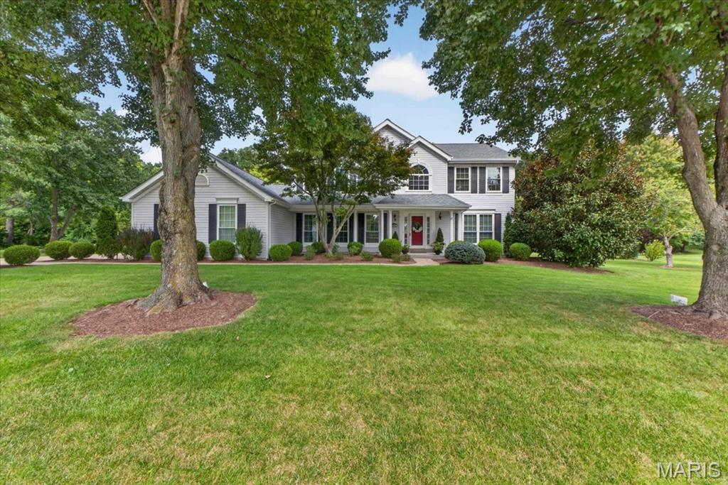 Your search ends here! If you're looking for a one-acre lot in Weldon Springs, located in a cul-de-sac and backing onto woods, this is your opportunity to own a charming home that radiates pride of ownership. The expanded front porch adds a touch of Southern charm as it welcomes you inside.
Upon entering, you'll be greeted by a spacious two-story foyer with a center-hall layout and beautiful wood floors in the main traffic areas. French doors lead into the family room, which connects to a large all-season room, perfect for hosting gatherings. While the dining room is currently being used as an office, it can easily be converted back into a traditional dining space, conveniently located right off the kitchen.
The kitchen boasts a breakfast room, a walk-in pantry, ample cabinet space, and an island complemented by stainless steel appliances and granite countertops. From the breakfast area, you can access the expanded gazebo, just steps away. The main floor laundry is discreetly tucked away from the hustle and bustle of the kitchen area.
Upstairs, you'll find neutral decor and a spacious primary suite with a large walk-in closet and a luxurious bathroom featuring separate vanities, a tub, and a shower. 
Additionally, the finished lower level features a recreation room, a full bathroom, a hobby room, storage space, and a wet bar, making this home perfect for entertaining and creating lasting memories.
Professional photos will be uploaded by August 26, and showings will begin on August 27.