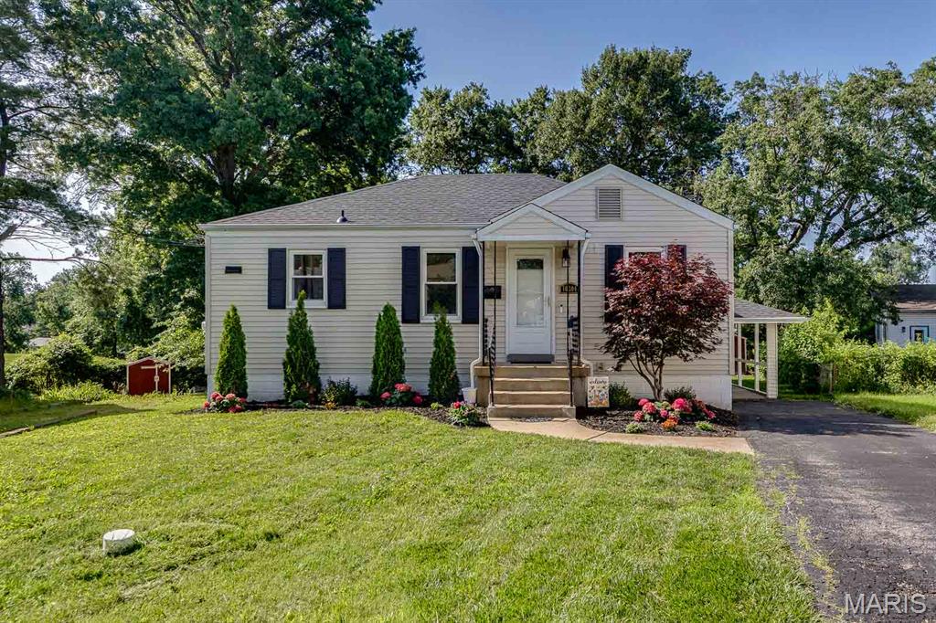This charming 2 bed/1 bath home sits on a beautiful, large lot measuring in at nearly an acre! There is a stone patio that overlooks the gently sloping yard with plenty of room to host a bar-b-que and space for your babies and/or fur babies to run and play. In the front yard, tasteful landscaping greets you and your loved ones. Exterior improvements include a newer roof (2023),and replacement of all exterior window screens. Inside the freshly painted interior is a cozy and bright family room and kitchen featuring newer appliances (2023) including dishwasher, stove, microwave and fridge (included in sale).In 2024, the bathroom was renovated with new floors, shower tile and fixtures, mirror, light fixtures and exhaust fan. The walkout basement is clean, dry, and partially finished with plenty of storage and a laundry area (washer and dryer included in sale). You will also be pleased to discover a newer (2024) HVAC system as well as hot water heater and copper water lines installed in 2025! Come take a look at this inviting abode just waiting for its new owner. You!