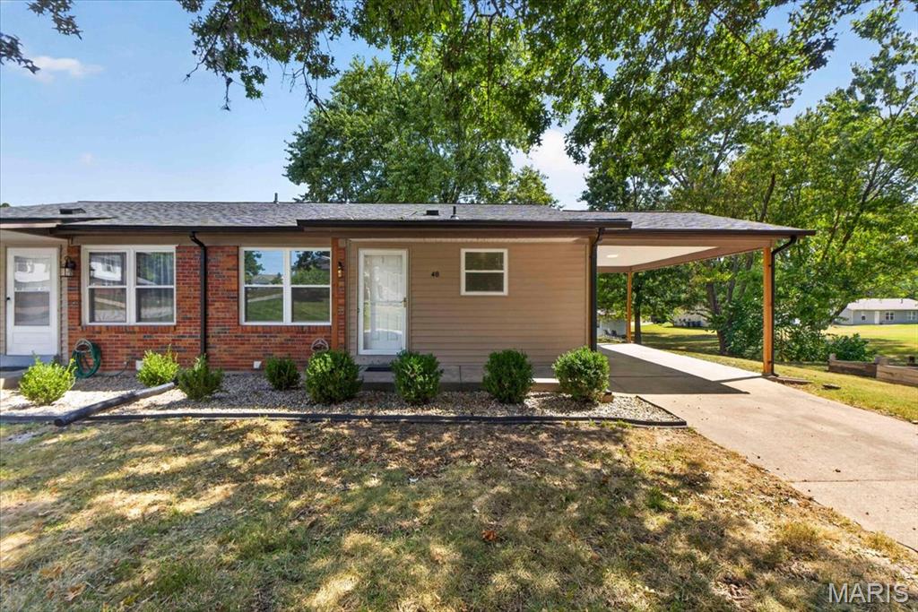 Welcome 48 Laura Drive.  Beautifully updated inside and out, this property offers three bedrooms, one full bath and plenty of space in the walkout lower level.  New siding and several new windows/ doors have been installed.  Upon entering, you’ll notice the crisp white trim that flows throughout the soothing fresh paint colors on the walls, and new luxury vinyl plank flooring. Updated eat-in kitchen with flat top electric stove, built-in microwave and dishwasher, plus enclosed pantry space. The window above the sink overlooks the front yard, and the sliding glass door access adds additional lighting and outdoor entry a breeze. The full hall bath offers a the tub/shower combo, vanity and commode. The bathroom also features linen closet storage. Main level hosts three lovely sized bedrooms. The unfinished walkout lower may serve as abundant storage space now, but with roughed-in plumbing ready to go, this lower-level space could easily be broken up into an additional bathroom with space for an additional bedroom or extra living area.   Although 48 Laura is being sold as its own home, just sharing a wall with its neighbor, there is really a mix of possibilities with this versatile structure. Purchase No. 48 its own or purchase both units and use the additional unit as a rental to generate income that could help offset the mortgage costs.