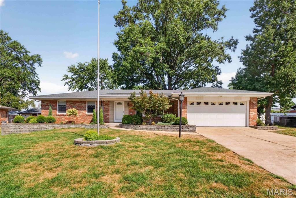 Located in the Lindbergh School District, this well-maintained and well-built brick ranch has been lovingly cared for by the same family for over 60 years! A great floorplan features hardwood floors throughout most of the main level, newer windows, and numerous recent updates including a new main plumbing stack, new electrical panel, newer roof, and some fresh landscaping and freshly painted. The inviting living room flows into the spacious family room with fireplace, which is partially open to the kitchen. Sliding glass door opens to the fenced-in backyard. Three bedrooms and two full baths complete the main level. The finished lower level offers additional living space and convenient walk-up access to the backyard. Two car garage. A wonderful opportunity to make this lovingly maintained home your own!