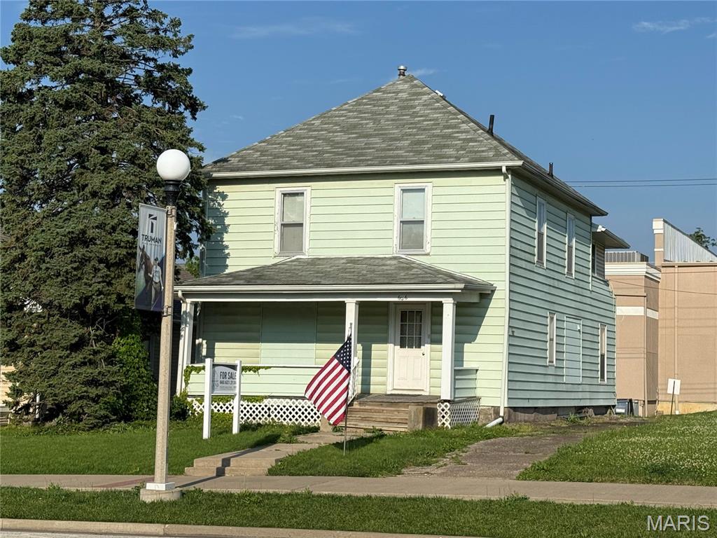 This well-maintained residential home sits  just steps from Truman State University, AT Still University, and Northeast Regional Medical Center in Kirksville, Missouri. Located in a high-traffic area, this property boasts excellent business potential and is zoned commercial. Previously rented as a multi-family dwelling for students, it features 5 bedrooms and 3 full baths and would also make a nice single family home.  Included in the sale are three vacant lots at 602 South Franklin and 105/107 West Filmore, offering ample opportunities for expansion or development. Don't miss this chance to invest in a prime location with both residential and commercial possibilities!