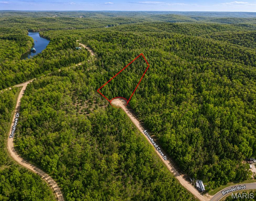 Your Lake of the Ozarks Dream Begins Here!

Discover the perfect combination of space, privacy, and convenience with this beautiful 2.10-acre property on Arrowhead Cove Drive in the heart of the Lake of the Ozarks area. Whether you're looking to build your dream home, create a relaxing vacation retreat, or invest in one of Missouri's most sought-after destinations, this property offers endless possibilities.

Surrounded by the natural beauty that makes the Lake of the Ozarks famous, this spacious tract provides plenty of room to design and build exactly what you've envisioned. Enjoy the peace and tranquility of a private setting while remaining just minutes from lake access, public boat ramps, marinas, waterfront dining, golf courses, and the area's most popular recreational attractions.

Spend your days boating, fishing, swimming, and exploring the lake, then return home to your own private escape nestled among the rolling Ozark landscape. With the area's continued popularity and growth, properties offering this much acreage in such a desirable location are becoming increasingly difficult to find.

Property Highlights:

2.10 acres in the desirable Lake of the Ozarks area
Located on Arrowhead Cove Drive near Rocky Mount, Missouri
Ideal for a custom home, vacation property, or investment
Minutes from marinas, boat ramps, and lake access
Enjoy boating, fishing, water sports, and outdoor recreation
Private setting with plenty of room to build and expand
Convenient access to shopping, dining, entertainment, and local attractions
Excellent long-term investment potential in a high-demand lake market
Whether you're seeking a peaceful retreat, a place to create lasting family memories, or a smart land investment, this property checks all the boxes. Don't miss your chance to own a piece of the Lake of the Ozarks lifestyle—opportunities like this don't stay available for long!