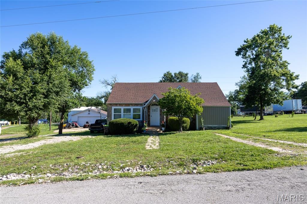 Welcome home to small-town living at its finest! This charming 4-bedroom, 2-bath home offers over 2,100 square feet of comfortable living space with a functional layout and plenty of room to grow. Sitting on just over half an acre, this property provides the perfect blend of convenience, space, and privacy while being located close to downtown Summersville.

Inside, you'll find thoughtful updates throughout, including a beautifully updated kitchen with new countertops, freshly painted cabinets, and stylish herringbone tile flooring. The primary suite offers a relaxing retreat with an updated bathroom featuring a custom walk-in shower.

Outside, enjoy the spacious yard and the added versatility of a detached garage/shop, providing extra storage, workspace, or room for hobbies. Whether you're looking for your first home, more space for your family, or a peaceful place to settle down, this property offers the comfort and character you've been looking for.

Don't miss your opportunity to own this well-maintained home in the heart of Summersville!