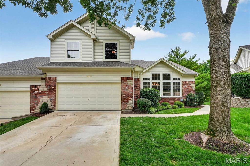 1.5 Story Villa Backing to Woods in Sought after Stonehill Village.  Gated Entry is ideal for security.  Over 3,300 total sq feet of living space. Desirable floor plan with main floor primary suite and laundry.  Entry foyer with wood floors is flanked by separate dining room with vaulted ceiling, wall of windows, and gas fireplace.  Remodeled Kitchen with center island, quartz countertops, and custom cabinetry some with glass inlay. Kitchen also features farm sink, back splash, and beverage center. Cozy sun room/den with tongue and groove ceiling is great place to watch TV and walks out to private deck overlooking trees! Large Family Room with gas fireplace and arched windows providing tons of light.  Spacious primary bed with large bay window, brand new carpet, and built in speakers. Primary bath with dual sinks and separate tub and shower flows into walk in closet. There are two add’l beds upstairs with full bath.  Loft area is perfect for work station. Finished walk out lower level Rec Room with another gas fireplace and Bar. Plus Bed #4 and full bath.  Tons of space for entertaining and hosting the grandkids. 2 car garage. Custom window coverings. Dream lot backing to trees provides privacy and peace & quiet.  Ideal floor plan w/ main floor primary. Convenient location off Baxter near all things Chesterfield has to offer.  This is the villa you’ve been looking for!