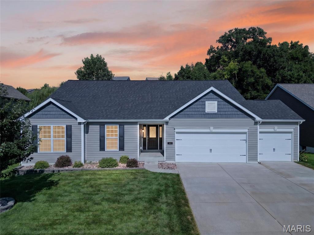 Welcome to Brookside Estates, where modern design meets everyday comfort! This beautifully appointed 3-bedroom, 2.5-bath home offers over 2,012 square feet of thoughtfully designed living space in the highly desirable Fort Zumwalt School District.

Step inside to an inviting open floor plan featuring soaring 10-foot ceilings in the entry, kitchen, and living room, creating a bright and spacious atmosphere perfect for both everyday living and entertaining. Durable luxury vinyl plank flooring flows throughout the main living areas, while the stunning kitchen boasts quartz countertops, ample cabinetry, and generous prep space that will delight any home chef.

The spacious primary suite provides the perfect retreat, while all three bedrooms feature large walk-in closets, offering exceptional storage throughout the home. A convenient half bath and functional layout make entertaining guests effortless.

Looking for room to grow? The unfinished lower level is ready for your personal touch with a bathroom rough-in already in place, making it easy to create additional living space, a home theater, fitness room, office, or guest suite.

Step outside to your own backyard oasis! The fully fenced backyard and expansive covered patio create the perfect setting for morning coffee, weekend barbecues, game-day gatherings, or relaxing evenings with family and friends. This outdoor space was truly designed to be enjoyed year-round.

The 3-car garage offers plenty of room for vehicles, storage, and hobbies, completing this home's exceptional functionality.

As a resident of Brookside Estates, you'll enjoy outstanding neighborhood amenities including a community swimming pool, playgrounds, scenic ponds, basketball courts, and walking trails, providing endless opportunities for recreation and connecting with neighbors.

Conveniently located in the heart of O'Fallon, you'll have quick access to shopping, dining, parks, and major highways while enjoying the charm of a welcoming neighborhood.

Don't miss your opportunity to own this move-in-ready home that perfectly combines stylish finishes, flexible living space, and an incredible community. Schedule your private showing today!