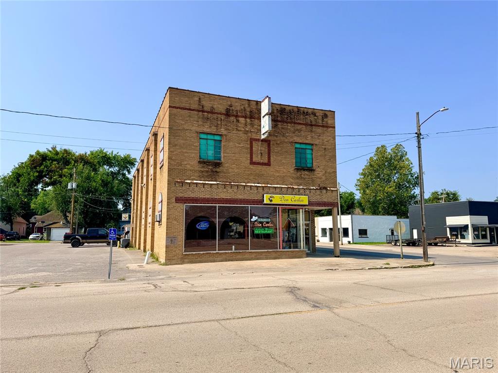 Nice value-add investment opportunity at 150 West Yoakum Avenue, Chaffee, MO.  This 6,640 SF building, constructed in 1951 as the Chaffee Mason Lodge, presents a mixed-use opportunity for a combination of continued restaurant use (currently Don Carlos Mexican Restaurant on the first floor), with residential/apartment, office, or meeting/event space upstairs.  Boasting ample open square footage, its own off-street parking lot, and solid brick construction, this property offers versatility and potential for a range of retail, residential, or event space ventures.  With its strategic location along Yoakum Ave. and substantial square footage, this property is attractive for value-add investors looking to improve a solid property through second floor improvements and increased leasing efforts.