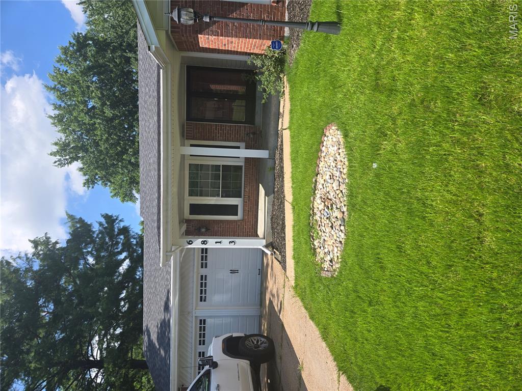 Welcome home to this well cared for beautiful and spacious ranch.  This lovely home boasts a spacious formal living room and formal dining room.  Enter into the main floor family room through the double doors.  The updated kitchen is waiting for you to cook and entertain your guests.  The family room leads to a spacious deck and large backyard.  The primary bedroom is very large and has a custom closet installation and private full bath.  There are two additional large bedrooms and another full bath on the main level.  You will also have plenty of storage in the full walk out basement.  Not to mention the attached 2 car garage, updated light fixtures and ceiling fans.  This home is adorable, move in ready and waiting for you!