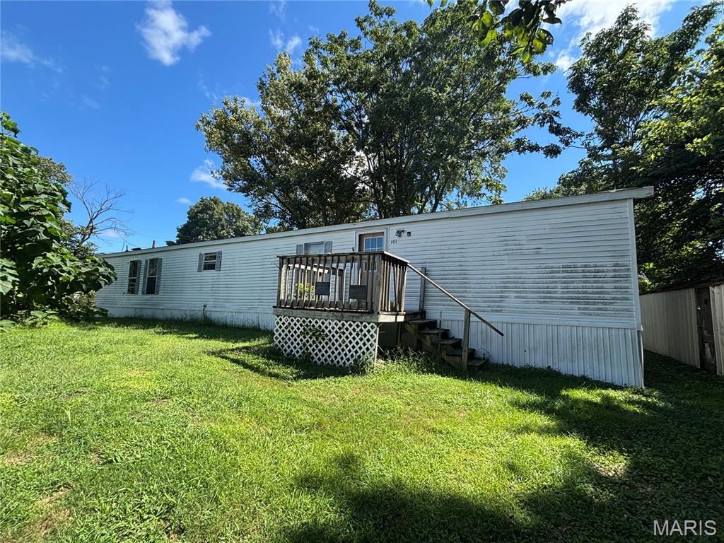 Charming Corner-Lot Mobile Home with Lots of Potential! Bring your vision and finishing touches to this spacious 2-bedroom, 2-bath mobile home located on two nice-sized corner lots in Pocahontas, IL! This property offers plenty of room, both inside and out, and is ready for someone looking to create a comfortable home with a little TLC.  
Step inside to find **generously sized rooms, an open living room and kitchen area, and a convenient laundry room complete with washer and dryer. The primary bedroom features a nice-sized private bath with a relaxing garden tub. Outside, enjoy the benefits of two corner lots with mature shade and plenty of space for outdoor activities, gardening, or simply enjoying the yard.  Two adjoining parcels make up this sale.  Lot with mobile home and the lot to the South of it.
The home is in need of repairs and is being sold AS IS, making this an opportunity for a buyer ready to roll up their sleeves and put their own personal touches on the property. With some work and imagination, this could be a great place to call home!  Great corner-lot location, spacious rooms, two full baths, and plenty of yard space—come take a look and see the possibilities!