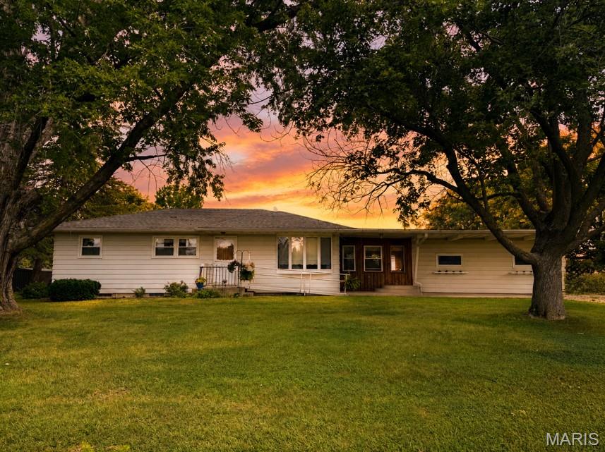 Discover peaceful country living on this beautiful 6+/- acre property featuring a charming 3-bedroom, 1.5-bath home surrounded by serene views and natural beauty. Enjoy the established grape vines and pear trees, along with plenty of space to garden, relax, and enjoy the outdoors. The property includes a spacious 5-bay barn with a new roof installed in 2022, a garden shed, and a full finished basement complete with a workshop—perfect for hobbies, projects, or additional living space. Major updates include a new furnace and A/C installed in 2026. If you're looking for privacy, space, and a peaceful rural setting, this property offers it all. Pending survey and auction of items in October.