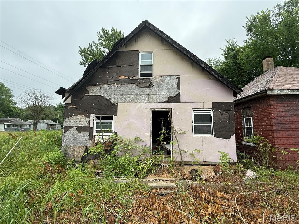 Investor Special – Full Rehab or Tear Down Opportunity!
Property Type: Single-Family Residence
Condition: Extensive Repairs Needed
Access: Use caution — unsafe structure

This property presents a prime opportunity for seasoned investors or builders looking for a challenging but rewarding project. The home has suffered severe neglect and will require a complete interior and exterior overhaul, or potential demolition and redevelopment. Exterior: Siding and sheathing are exposed or missing; multiple layers of material in visible disrepair. Roof appears unstable in sections.
Interior: Not accessible for safe entry. Front door is detached and the porch is compromised. Interior visible through the door shows stripped walls, debris, and evidence of structural deterioration.
Lot: Deep lot with vegetation overgrowth. Appears to be a nice buffer of trees on one side. Potential for clearing and rebuild.
Utilities: Unknown condition — buyer to verify.
Cash only or hard money financing preferred due to property condition.