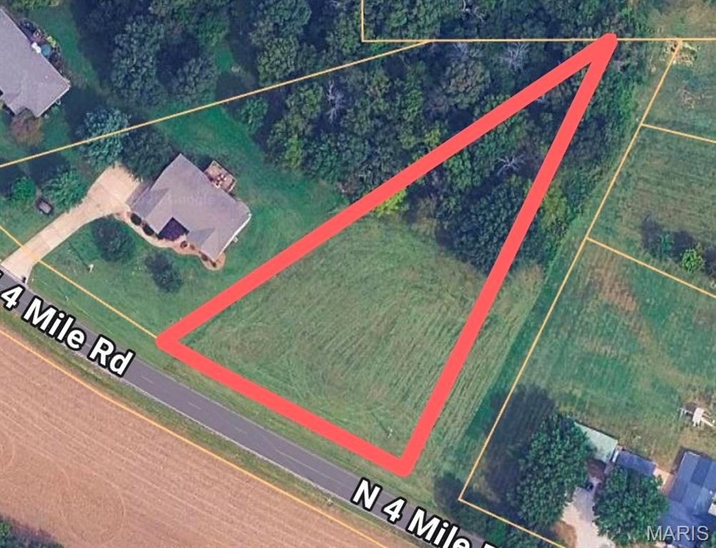 Looking for that perfect place to build your new home? This 1-acre lot in Cobblestone Creek offers the perfect balance between peaceful country living and the benefits of being just a short distance to town with shopping, restaurants, entertainment and more.  Located directly off Four Mile Road the lot is cleared in the front and has mature trees lining the back of the property.   Enjoy fishing the 4+ acre, stocked lake or just strolling around it.  Restrictive covenants protect your investment.  Don't Miss This One!