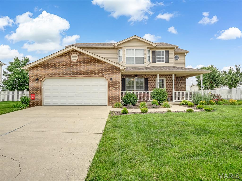 Welcome home to this beautifully updated two story home tucked away at the end of a quiet street and backing to open fields for added privacy and peaceful views. Relax on the wrap around covered front porch or enjoy the backyard patio overlooking the open space behind the home. Inside, the two story foyer welcomes you into a spacious layout featuring a formal dining room, inviting living room with gas fireplace, and an eat in kitchen with stainless steel appliances, abundant cabinet space, and a convenient workstation area. The main floor laundry includes a large pantry and easy access to the oversized 2 car garage. A remodeled half bath completes the main level. Upstairs offers two guest bedrooms, a bonus room or possible non conforming fourth bedroom, and a full guest bath. The spacious primary suite features a soaking tub, separate shower, double vanity, and walk in closet. The unfinished lower level includes custom wood shelving, a bathroom rough in, and endless potential for future finishing. Major updates include a new roof installed at the end of 2025, all new carpet on the stairs and upper level, all toilets replaced, and updated ceiling fixtures throughout most of the home. Located in the Waterloo School District, this home combines space, updates, and a peaceful setting all in one!