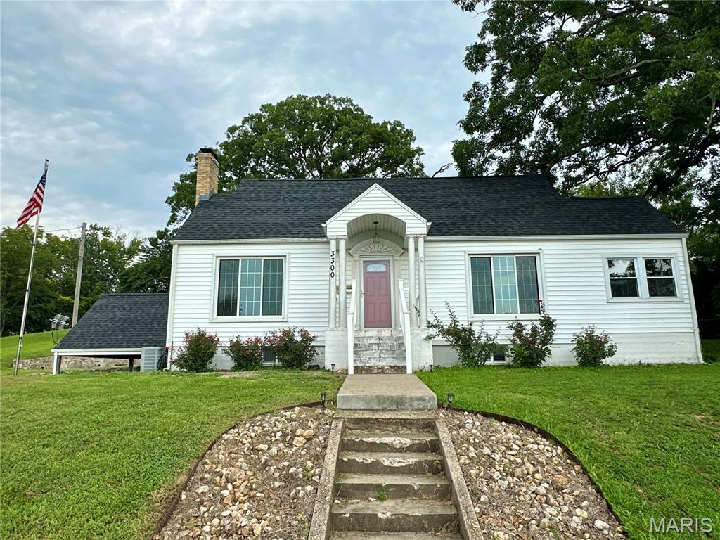 Come see this beautiful home overlooking the peaceful Oakwood community. Situated on 1.7 acres, this spacious property offers 4 bedrooms and 3 full bathrooms—an opportunity that's hard to find within the city limits.

From the moment you arrive, the impressive horseshoe driveway sets the tone for this exceptional home. Step inside to discover generous living spaces filled with character and versatility. The main level features a welcoming living room, a well-appointed kitchen, a charming sunroom, and two bedrooms. Upstairs, you'll find two additional bedrooms and a full bathroom, providing plenty of space for family or guests.

The basement includes an attached garage along with an expansive storage and workshop area, offering endless possibilities for hobbies, projects, or extra storage. Outside, you'll appreciate the detached garage, fenced backyard, and the privacy and space that come with a 1.7-acre lot.

Don't miss your chance to own this one-of-a-kind property that combines space, charm, and convenience—all within the city limits.
