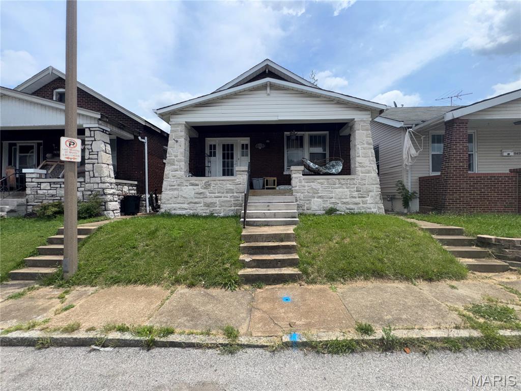 Welcome to 5432 Bates, a 2 bed, 1 bath Bevo home in South St. Louis City. The living room is spacious and features entry into the dining room with adorable stained glass windows. Original hardwood floors in most areas. The kitchen and bathroom are in modest condition. In the basement there is additional finished living space along with ample storage space. Outside you'll find a large wood deck with plenty of space for entertaining. Just minutes from Das Bevo, Gravois and all the other amenities in Bevo. Property to be sold in as-is condition.