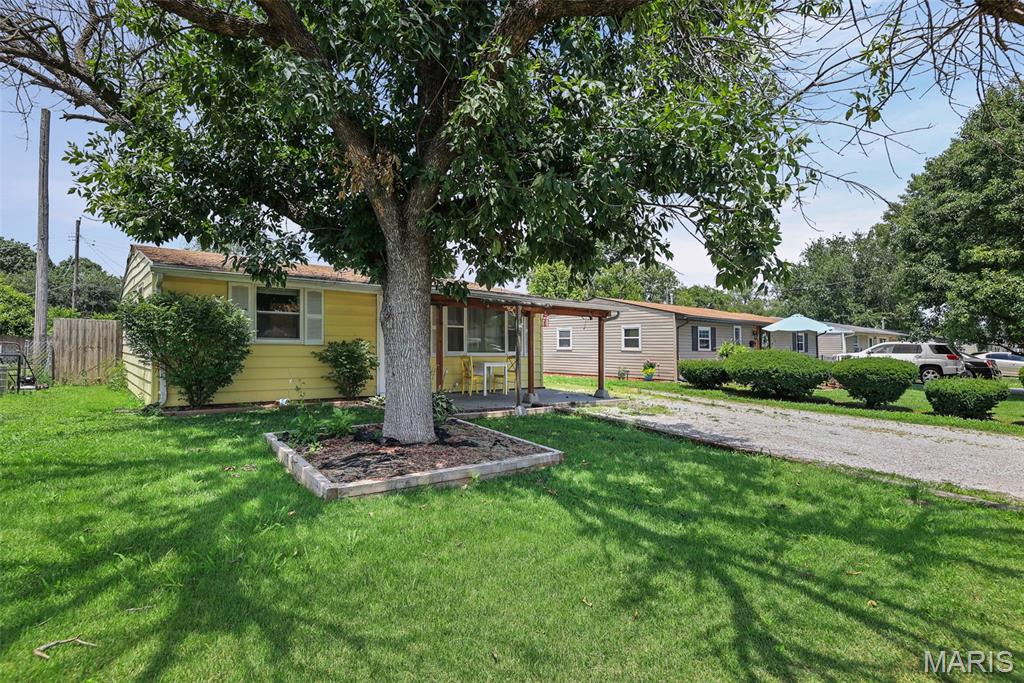 First time on the market! Lovingly maintained by the same family since it was built, this charming 2-bedroom home is ready for its next chapter. The interior features a freshly painted, neutral palette and a bright, ample-sized living room that welcomes you right in. Enjoy a functional eat-in kitchen that comes complete with the stove and refrigerator included.  Washer and dryer are also included.  
Extend your living space outdoors on the inviting covered front porch—perfect for morning coffee or relaxing evenings. The spacious, fully fenced backyard offers a safe haven for pets or play, along with two handy storage sheds for all your lawn tools and gear.
Property sold AS-IS. Seller will not provide any repairs or inspections.  Seller has completed the municipal housing inspection requirements; Buyer to comply with electric inspection requirements. Listing broker has attempted to offer accurate data & info is deemed reliable but not guaranteed. Square footage may not be accurate. Buyers & agents are responsible for verifying accuracy.