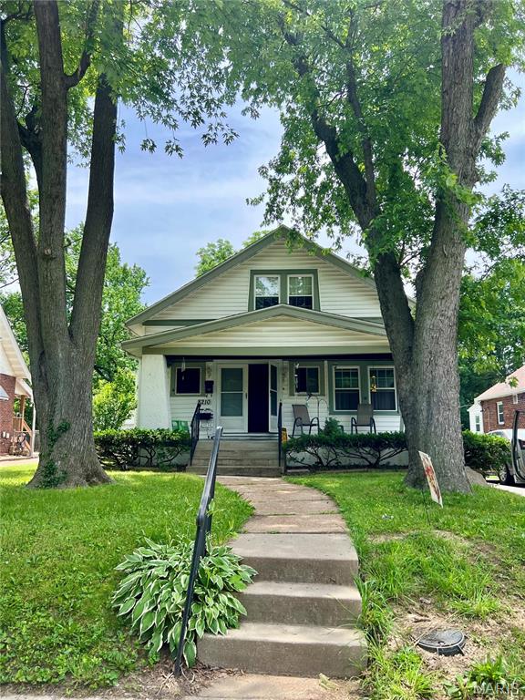 A Lot of Potential here! Great opportunity for for sweat equity or Investors! Absolutely Charming 1.5 Story home located on a Pretty dead end street w/ no through traffic. Features Include...  Large covered Front porch * New Large Driveway * Spacious Family Room w/ Fireplace * Large Dining Room * Hardwood Flooring * Main Floor Bedroom * Main Floor Full Bathroom * Spacious Kitchen * fridge, washer & dryer included * 2 Additional Bedrooms Upstairs, along w/ another Full Bathroom * Full Basement w/ walk-out * Newer HVAC * Roof * Level Backyard w/ A private treeline * This home is being sold as-is