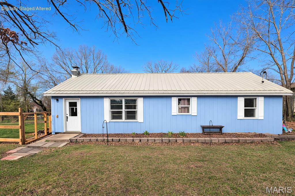Check out this rare find! This 3 bed, 2 bath home is located on over 2 acres inside Houston city limits! Lots of upgrades to this 1940's charmer. New windows, siding, flooring and HVAC system to name a few! Newly remodeled bathroom, updated kitchen with butcher block countertops and apron sink. Circular drive and partial basement. A newly installed 6ft wood rail and woven wire fence offers a great enclosure offers a great enclosure for pets. Plenty of space for outdoor gatherings, gardening or a fruit orchard, several peach trees have been planted. Lots of possibilities with this property!