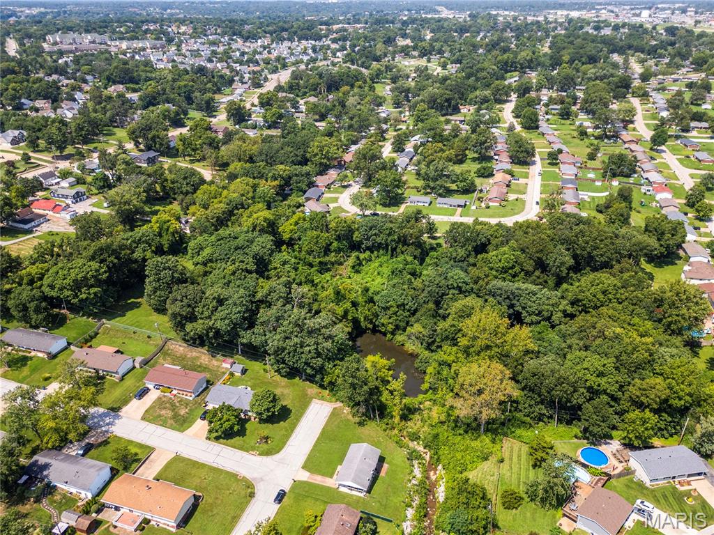 Discover an exceptional opportunity to own nearly 4 acres of private, wooded residential land in the highly desirable South County area. Surrounded by mature woods and natural foliage, this remarkable parcel offers a serene sense of seclusion while remaining conveniently positioned for everyday living.  A picturesque pond and natural spring add to the property’s unique character, creating an idyllic backdrop for a custom residence, private retreat, or secluded estate. With residential zoning and an abundance of natural beauty, this extraordinary property offers the opportunity to create a truly private oasis tailored to your vision. Private. Peaceful. Unparalleled potential. A rare offering for those seeking space, beauty, and privacy in a coveted South County setting.