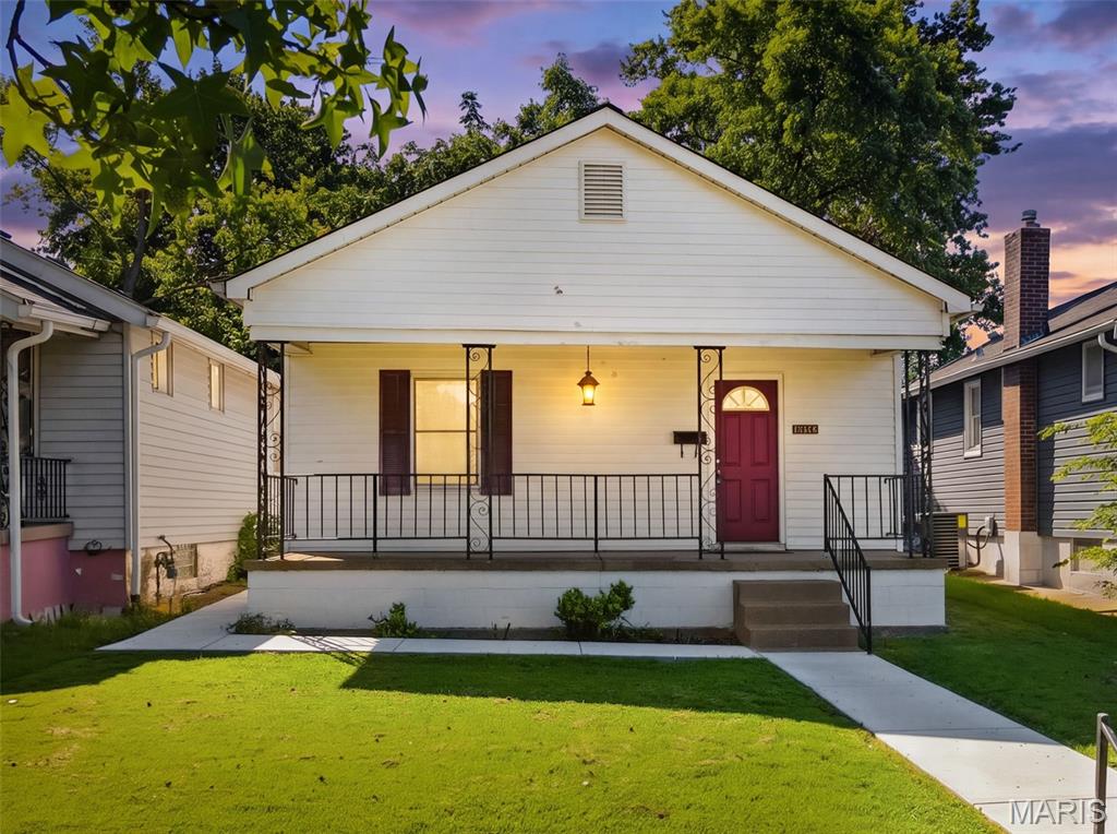 Welcome to the Hallmark-esque, tree-lined Dewey Avenue. This 2-bedroom, 1.5-bathroom home has been meticulously maintained by the seller. Perched above street level, the inviting covered front porch provides the perfect place to enjoy your morning coffee while overlooking the neighborhood's timeless South City charm.

Inside, you'll find fresh paint throughout and a newly remodeled primary bathroom featuring an extra-wide soaking tub designed for relaxation. The home's well-placed windows fill the living spaces with natural light throughout the day, creating a warm and welcoming atmosphere.

Step outside to enjoy a peaceful backyard, where greenery along the rear property line creates a private setting. Recent improvements include a newly poured concrete patio and wraparound sidewalk, creating attractive and functional outdoor living space. A storage shed offers additional room for tools, hobbies, and seasonal storage.

Walk-up basement with an ornate exterior door provides plenty of storage and future possibilities. 

New roof installed in 2025, and for added peace of mind, the seller is providing a one-year Choice Home Warranty. The home has already passed STL city occupancy inspection!

Enjoy quick access to Carondelet & Christy Park, placing some of St. Louis' most beloved green spaces within reach. Bonus? Tons of fantastic local coffee shops nearby to try out!