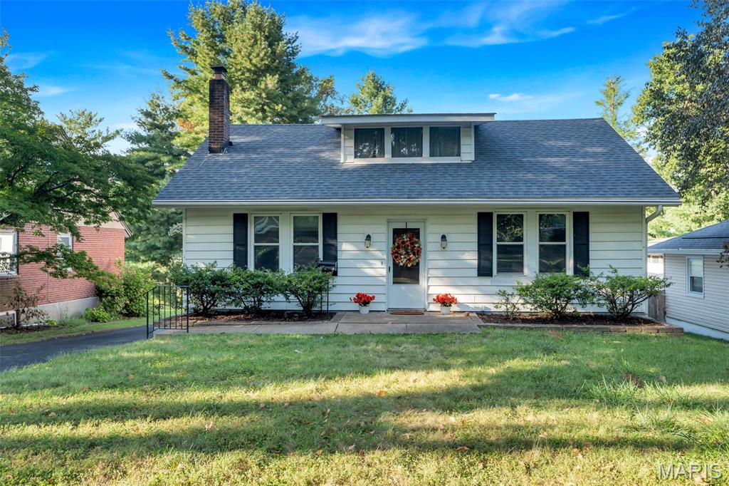 Sought after 3 bedroom/2-bathroom ranch in a desirable Webster Groves neighborhood! When you step into the home there is a large living room with non-functional fireplace and wood flooring that flows into the dining room and kitchen. Primary bedroom has updated flooring, ceiling fan, large picture window and an en-suite bath with walk-in shower. There are 2 additional bedrooms with hardwood floors plus another full bath in the hall on the main level. A family room leads to spacious deck overlooking a large, backyard making grilling and entertaining easy. The lower level has plenty of storage space, workshop area and possible office/sleeping area. Additional features: Oversized 2 car garage; Roof 2025; Water Heater 2023; Electrical Panel 2023; Bathrooms updated 2023; Fenced Yard. Great location, only minutes to schools, grocery stores, parks and highways.